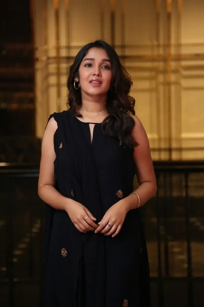 Actress Anikha Surendran in Black Dress at Butta Bomma Movie Trailer Launch